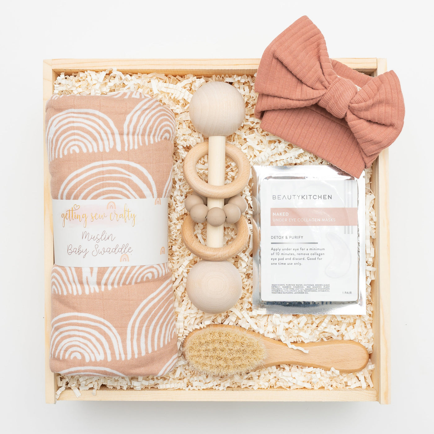 Celebrate the arrival of a new baby with this modern, elegant and practical gift box.