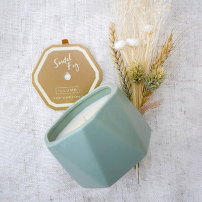 Help new home dwellers settle in with this beautifully refreshing gift box. Close up of Santal Fig Candle