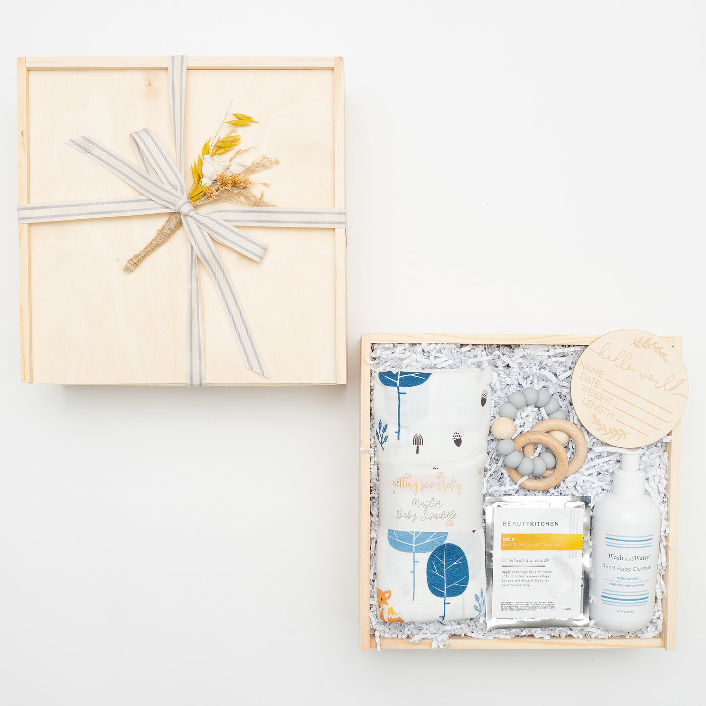 Celebrate the milestone of a new baby (and mom!) in your life with this thoughtful and elegant gift box.