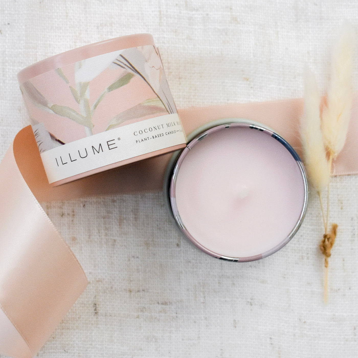 Enjoy this carefully curated gift box with all the makings for an unforgettable self-care day or night. Close up of Coconut Milk Mango Tin Candle