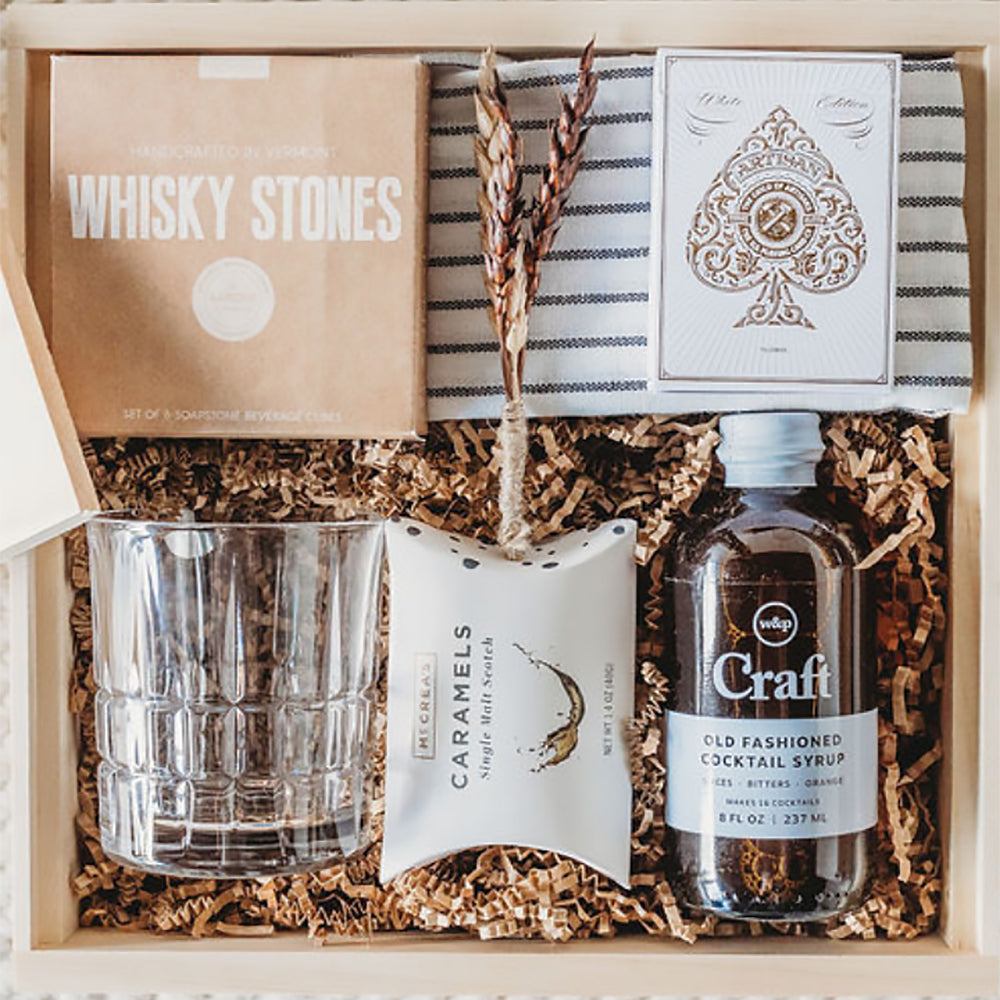 All the ingredients for a sophisticated nightcap. This gift box combines gourmet treats, specialty cocktail inspired contents, and a splash of fun for a refined night ahead.